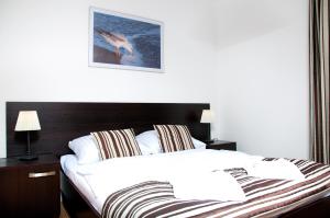 Apartament IKAR - 2 pokojowy przy morzu z własnym ogródkiem