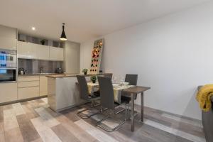 Appartements UnSejourAmetz-fr Meubles Ossons du T2 au T4 avec parking, : photos des chambres