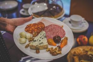 Classic Quadruple Room room in Hotel The Augustin