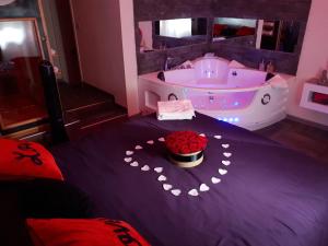 Appartements Le Reve d'une Nuit suite Amour : photos des chambres