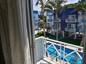 Apto a 70 metros da praia, Piscina, 03 Ar Condicionados, Vaga de Garagem