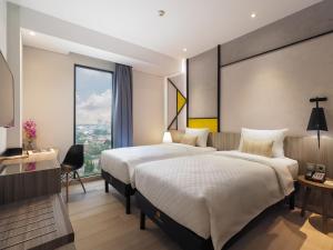 Phòng Hai Giường Đơn Loại Sang (Deluxe Twin Room)