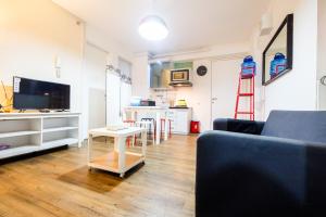 Modern and Comfy 3BR Bassura City Apartment By Travelio