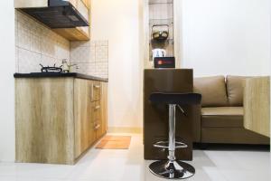 Well Designed 2BR Green Pramuka City Apartment By Travelio