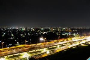 Well Designed 2BR Green Pramuka City Apartment By Travelio