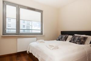 Warsaw Promenada Family Apartment by Noclegi Renters