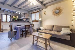 Maisons de vacances Aux 3 nids fleuris : photos des chambres