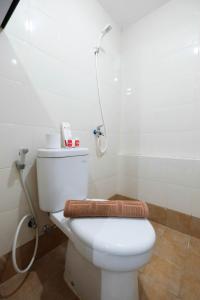 Comfy 2BR Bassura City Apartment near Mall By Travelio