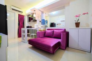 Comfy 2BR Bassura City Apartment near Mall By Travelio