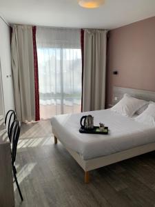 Double room in Hôtel Au Relais des Lilas