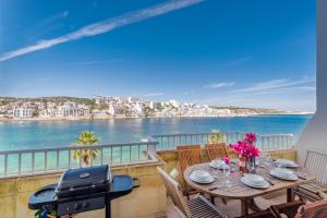 Blue Harbour Seafront 3 bedroom apartment, with spectacular sea views from terrace - by Getawaysmalta