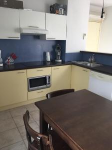 Appartements T 3 appart les jardins du phoebus : photos des chambres