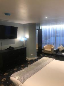 Family Studio Ground Floor room in Shores Holiday Apartments