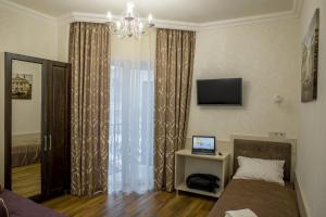 Twin Room with Balcony room in Mini Hotel Barvy Lvova on Hnatyuka St.