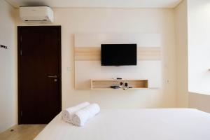 2BR Cozy and Modern LAvenue Apartment By Travelio