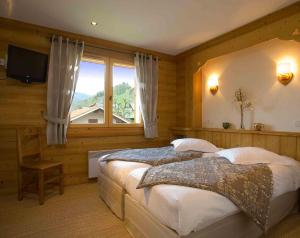 Maisons d'hotes Les ARAVIS chambre proche La Clusaz : photos des chambres