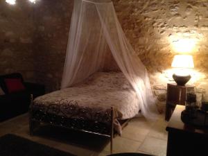 Maisons d'hotes Chambre Maison En Pierre Jacuzzi : photos des chambres