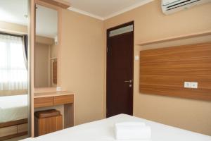 3BR with Sofa bed at Gateway Pasteur Apartment By Travelio