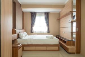 3BR with Sofa bed at Gateway Pasteur Apartment By Travelio