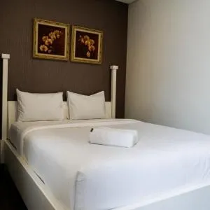 Strategic 2BR Apartment at Trillium Residence By Travelio - Plosobegem