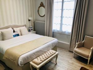 Hotels Kyriad Saumur Hyper Centre Hotel, Appartements, Seminaires et SPA soins Sothys Paris : photos des chambres