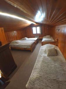 Chalets Le Tisonnier : photos des chambres