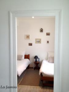 B&B / Chambres d'hotes Chambres d'Hotes L'Ostal de Pombonne : photos des chambres