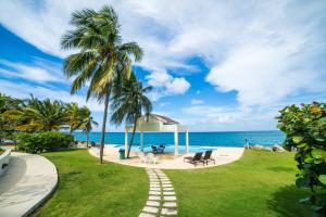 Whispering Seas - 2 Bedroom Luxury Ocean Front Condo