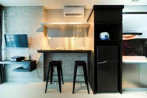 Spacious and Artsy Studio Apartment at Brooklyn Alam Sutera By Travelio