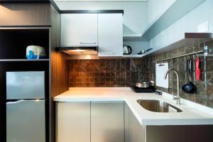 Spacious and Artsy Studio Apartment at Brooklyn Alam Sutera By Travelio