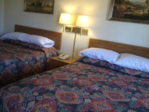 Queen Room with Two Queen Beds room in Economy Inn Alamogordo