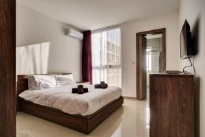 Three-Bedroom Apartment room in The Village Apartments