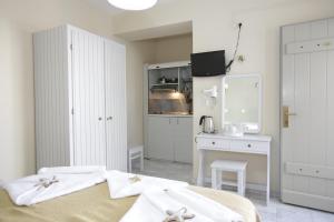 Studio with Partial Sea View (2 Adults) room in Alexandra's Rooms