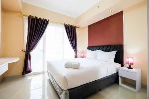 Bright and Stylish 1BR The Oasis Apartment Cikarang By Travelio - 贝克西