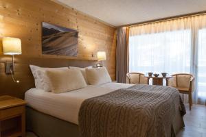 Hotels Chalet-Hotel La Chemenaz, The Originals Relais (Hotel-Chalet de Tradition) : photos des chambres