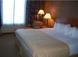 1 King Bed, Non-Smoking room in Ramada by Wyndham Watertown