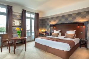 Hotels Le Grand Hotel : photos des chambres