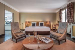 Hotels Le Grand Hotel : photos des chambres