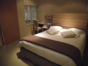 Hotels Hostellerie au Cygne : photos des chambres