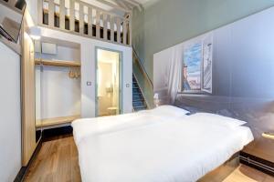 Hotels B&B HOTEL Orgeval : photos des chambres