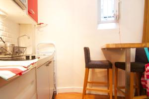 Appartements Studio Saint Sulpice : photos des chambres