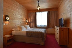 Hotels Chalet-Hotel La Chemenaz, The Originals Relais (Hotel-Chalet de Tradition) : photos des chambres