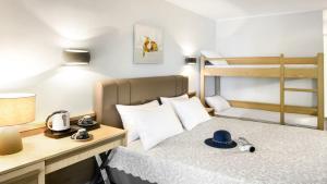 Family Room (2 Adults + 2 Children) Pool view room in Philoxenia Hotel