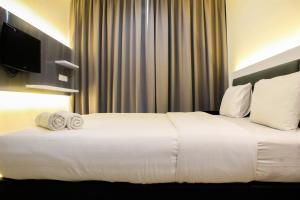 1BR Brooklyn Alam Sutera Apartment near BINUS By Travelio