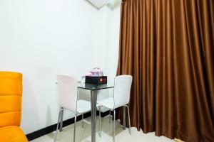 1BR Sky Terrace Lagoon Condo Apartment near Daan Mogot Mall By Travelio