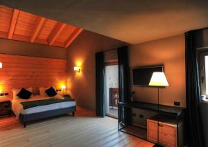 Junior Suite room in Alpi & Golf Hotel