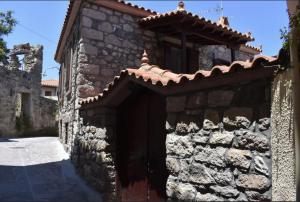 wood and stone in the path of lava Lesvos Greece