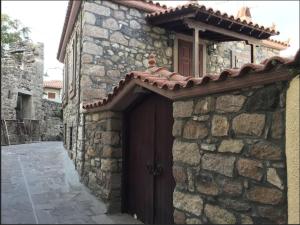 wood and stone in the path of lava Lesvos Greece