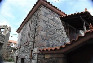 wood and stone in the path of lava Lesvos Greece