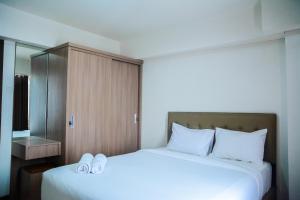 Cozy 1BR Apartment H Residence near MT Haryono By Travelio